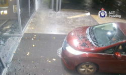 A maroon Honda Odyssey used in a break in A maroon Honda Odyssey used in a break in