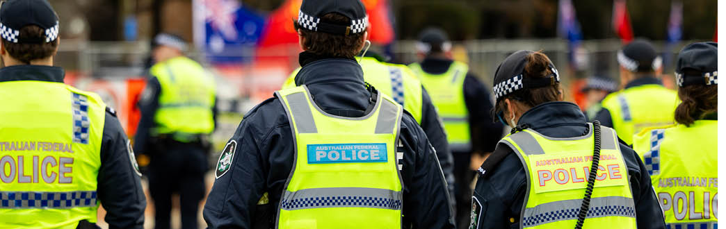 Police Officers in uniform and high visibility vests 