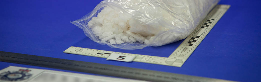 A picture of white crystal illicit drugs 