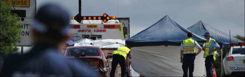 uniform officers at a road collision