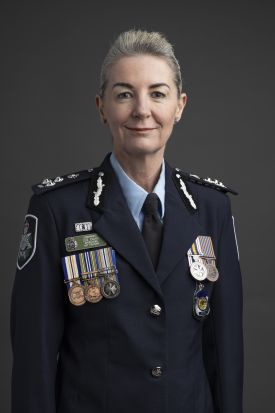 A pictire of Commander Sue Evans in uniform